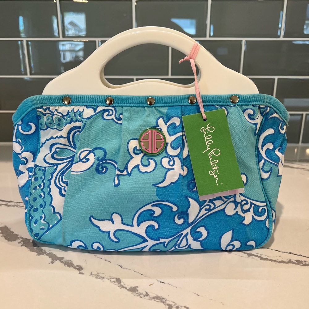 Vintage Lilly Pulitzer “un-Bermuda” bag in “making the rounds”
